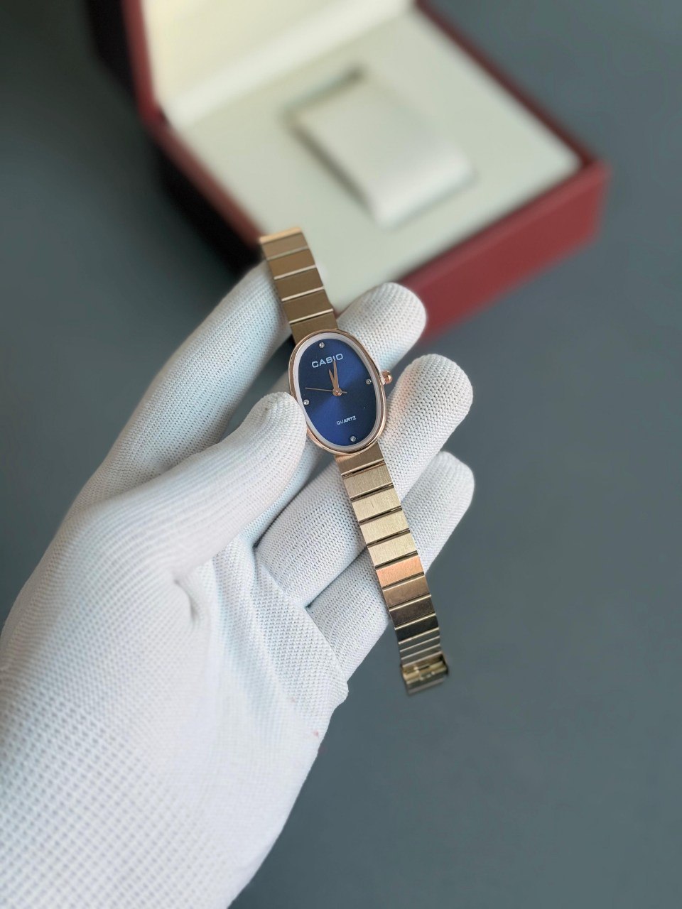 Casio Vintage Women's Oval Quartz Watch - Rose Gold with Black Dial and Crystal Markers