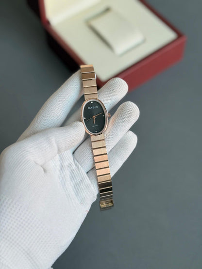 Casio Vintage Women's Oval Quartz Watch - Rose Gold with Black Dial and Crystal Markers
