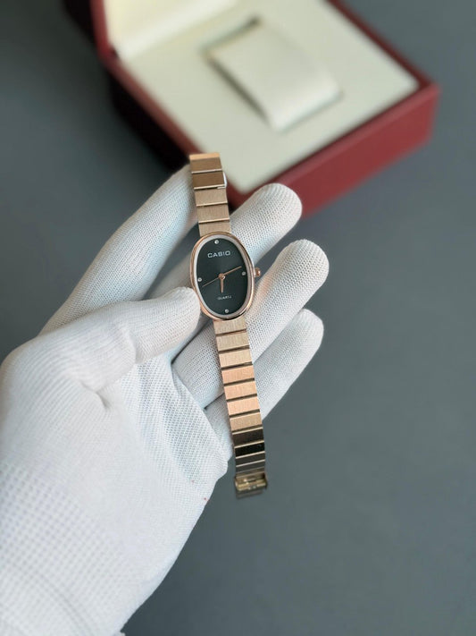 Casio Vintage Women's Oval Quartz Watch - Rose Gold with Black Dial and Crystal Markers
