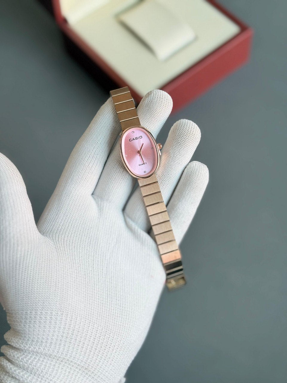 Casio Vintage Women's Oval Quartz Watch - Rose Gold with Black Dial and Crystal Markers